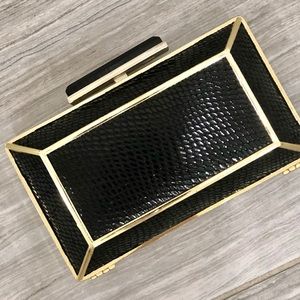 BCBG Black faux snake skin clutch